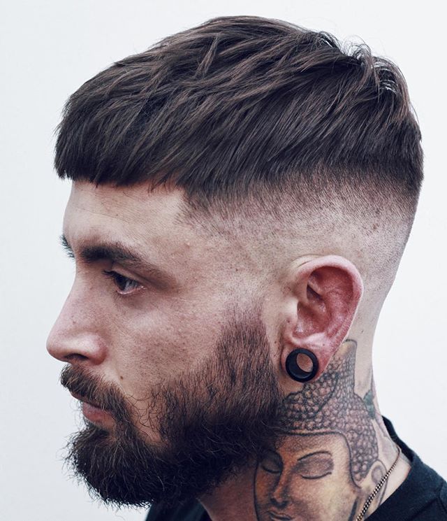 Short undercut hairstyle for men with longer top