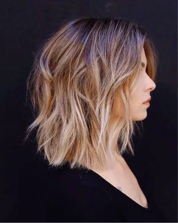 peinado melena midi con capas suaves