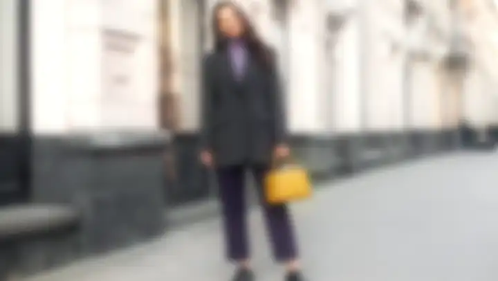 AI Try-On in PhotoDirector 365: the outfit on a person swapped from a reference photo